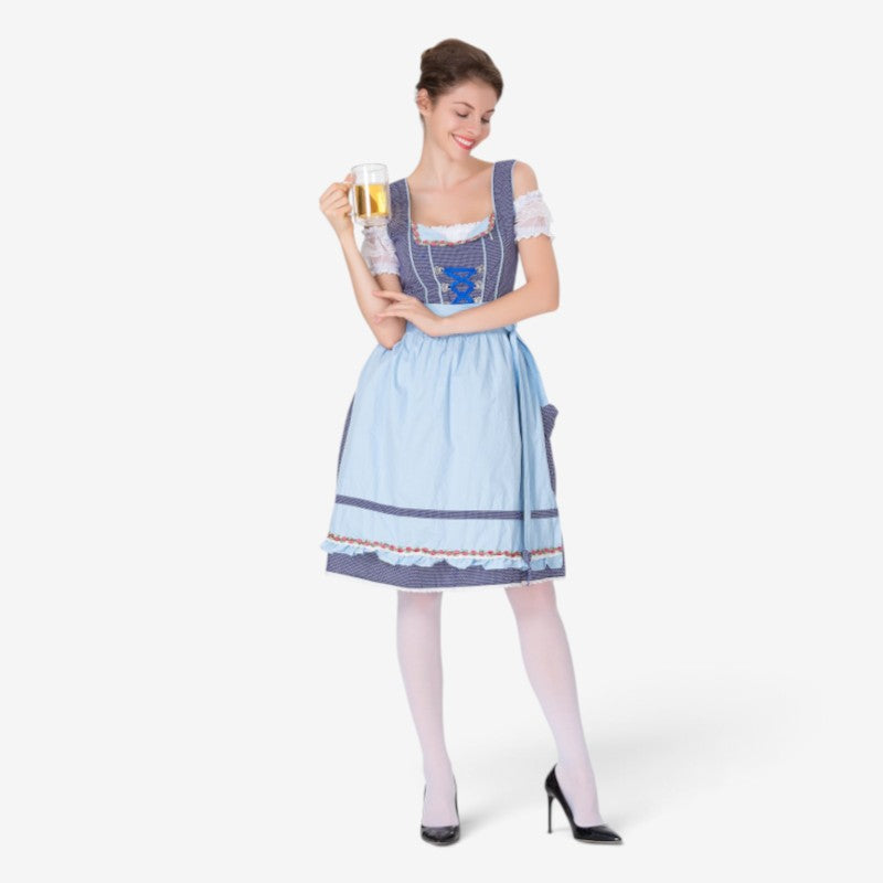 Traditional dirndl dress for women with a polka-dot bodice and ruffled apron