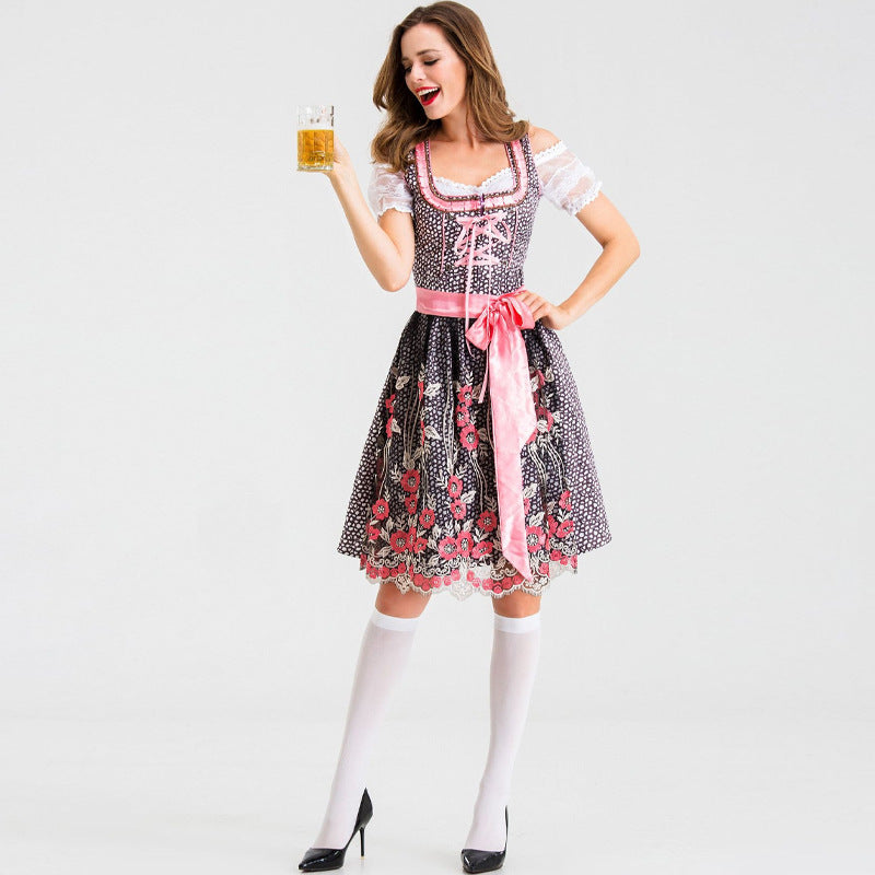 Dirndl til kvinder med blondeærmer og blomstret forklæde