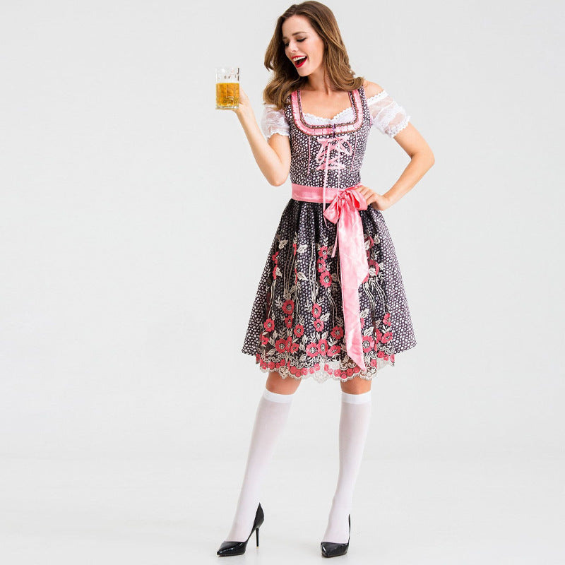 Dirndl til kvinder med blondeærmer og blomstret forklæde