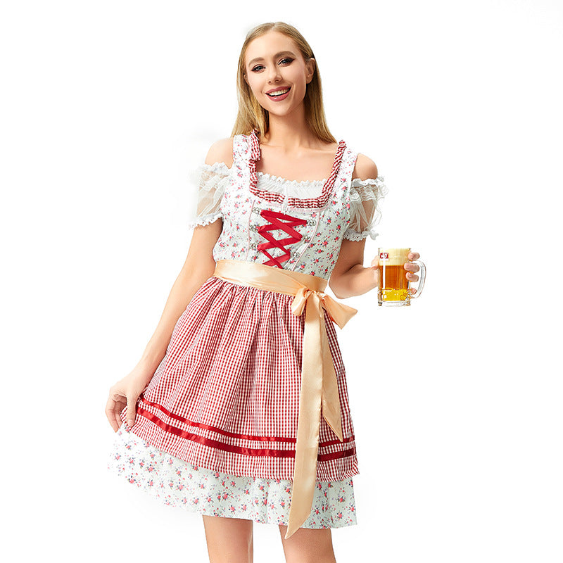 Traditionell klänning för damer med korsett och förkläde